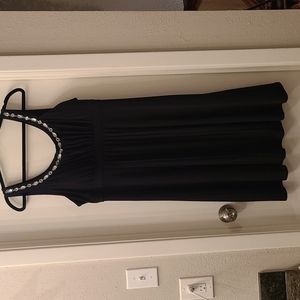 Black dress with bejeweled neckline